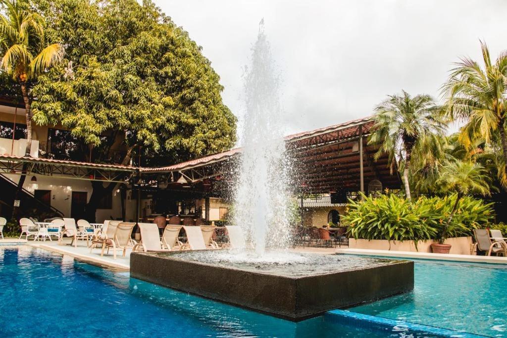 Hotel Coco Palms Playas del Coco Экстерьер фото